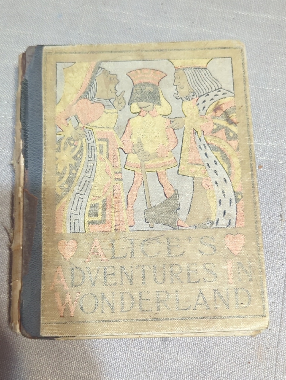 antique edition of book Alice's‎ Adventures in Wonderland by Lewis Carroll 1897